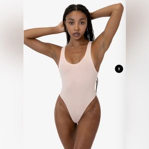 Los Angeles Apparel GARMENT DYE TANK THONG BODYSUIT in Seashell Pink size M